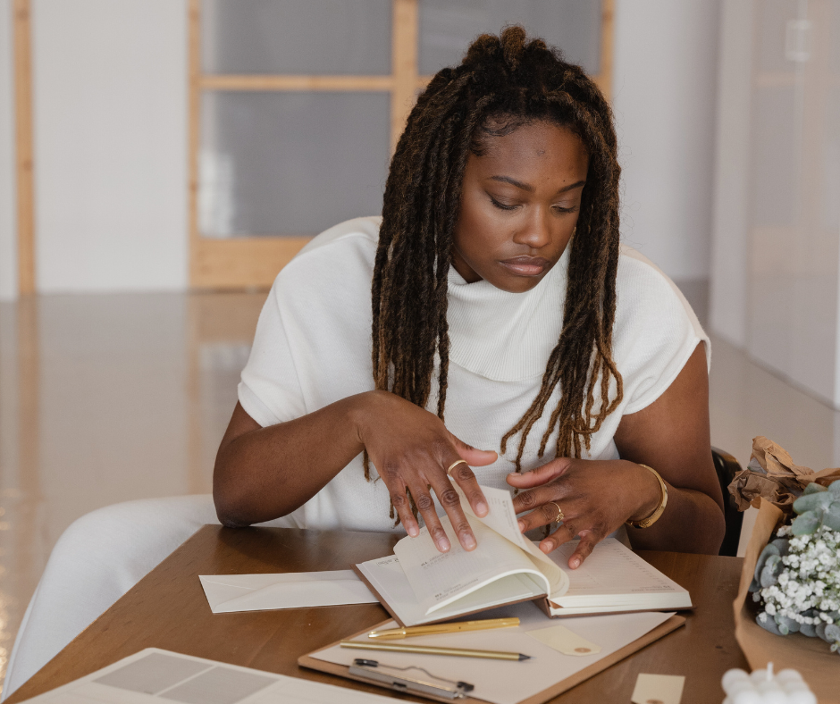 a designer reading her notes