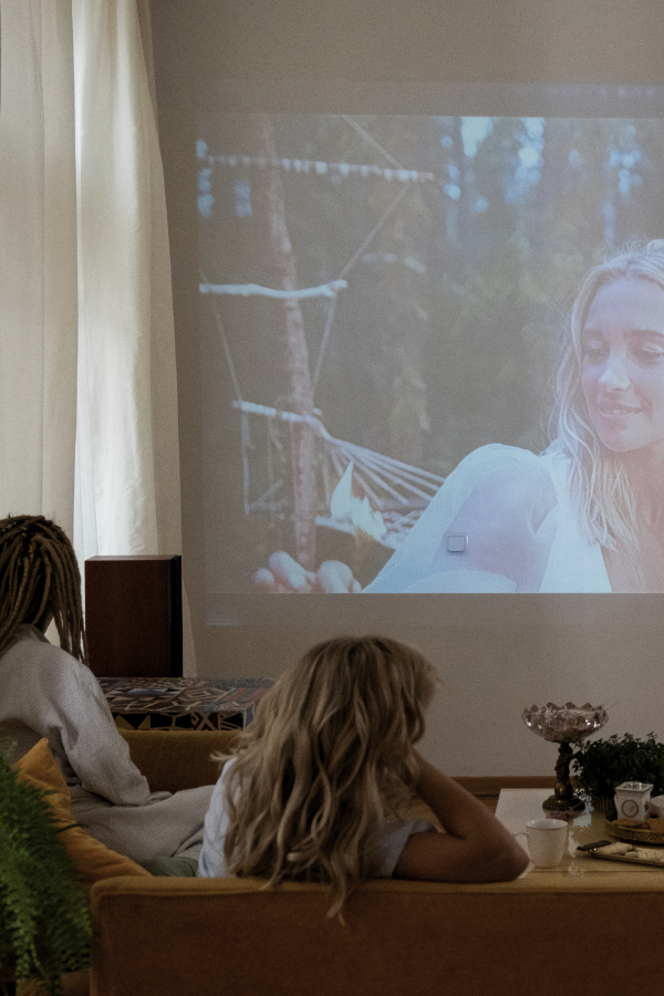 women watching movies about chefs on a projector