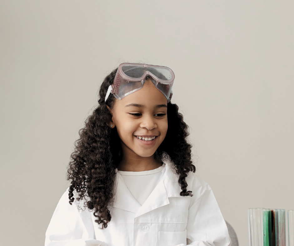 girl using a kids subscription box for science experiments