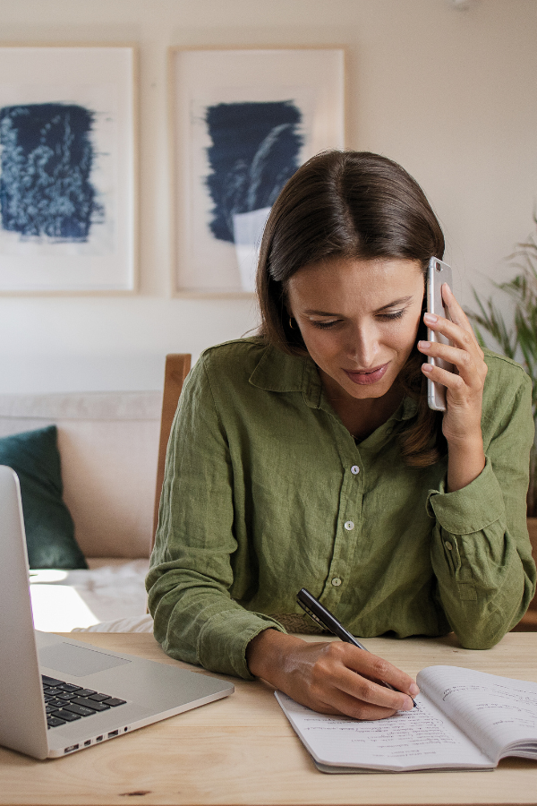 woman using crm software to manage client relationships