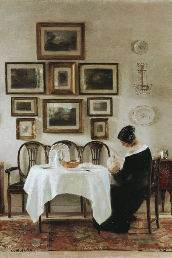 painting of a mother and her baby in a dining room surrounded by paintings