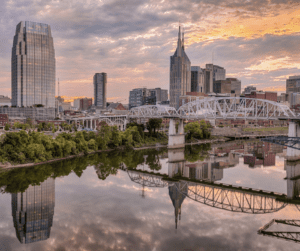 boutique hotels in Nashville along the city skyline at dusk