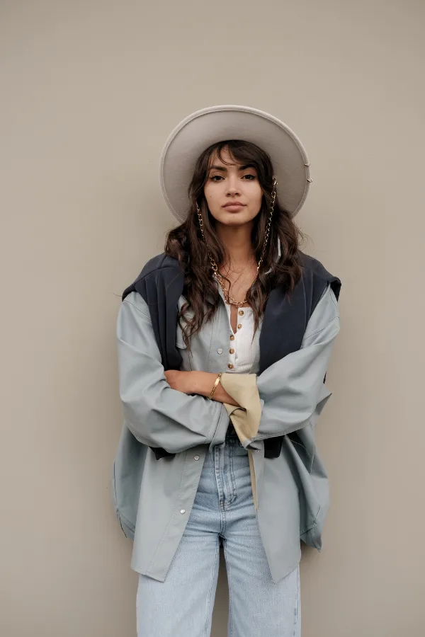 summer color analysis of woman with gentle contrast features (brown hair and brown eyes) while wearing cool-toned clothing