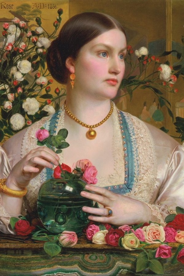 a woman with roses in a vase