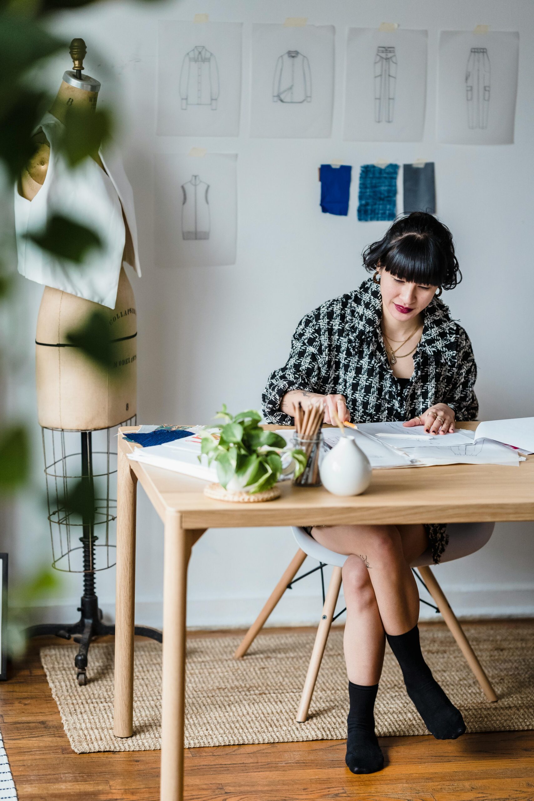 FAshion designer working in her studio