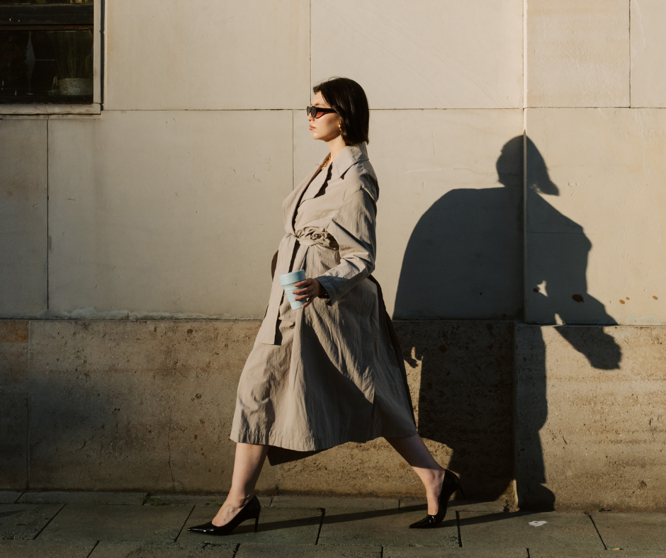 a woman walking in heels outside