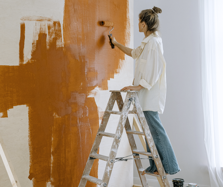 woman painting indoors