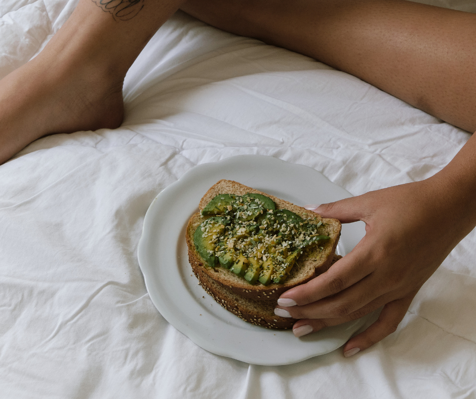 skincare from food; woman eats avocado toast