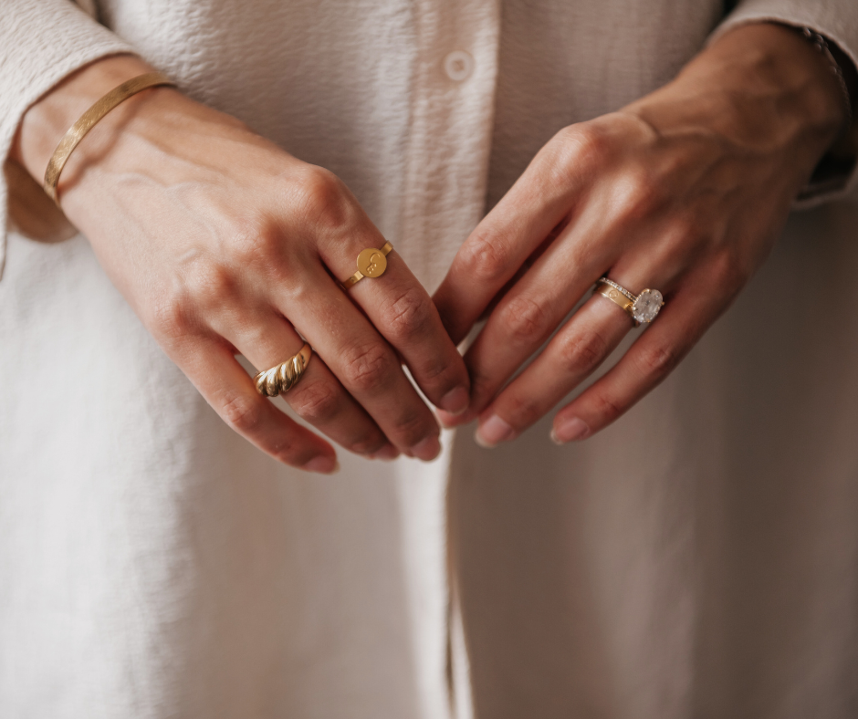 woman wearing rings and a bracelet