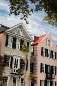 two row houses with trees above