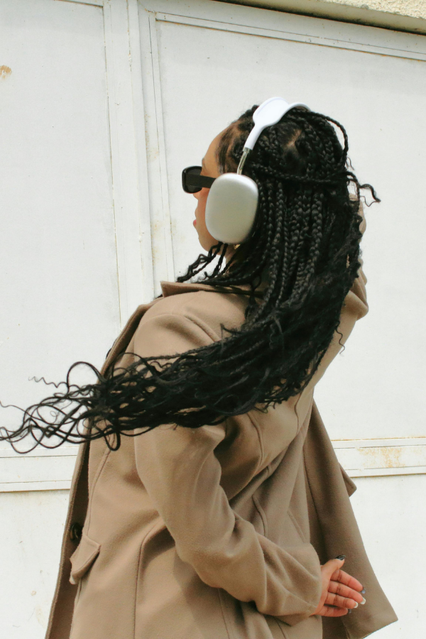 a woman relaxing with headphones on