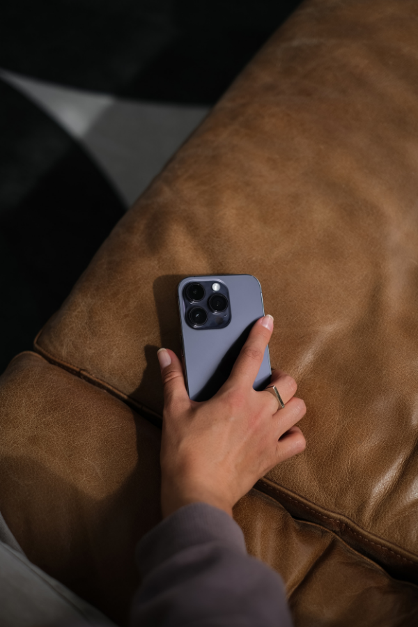 woman putting her phone down