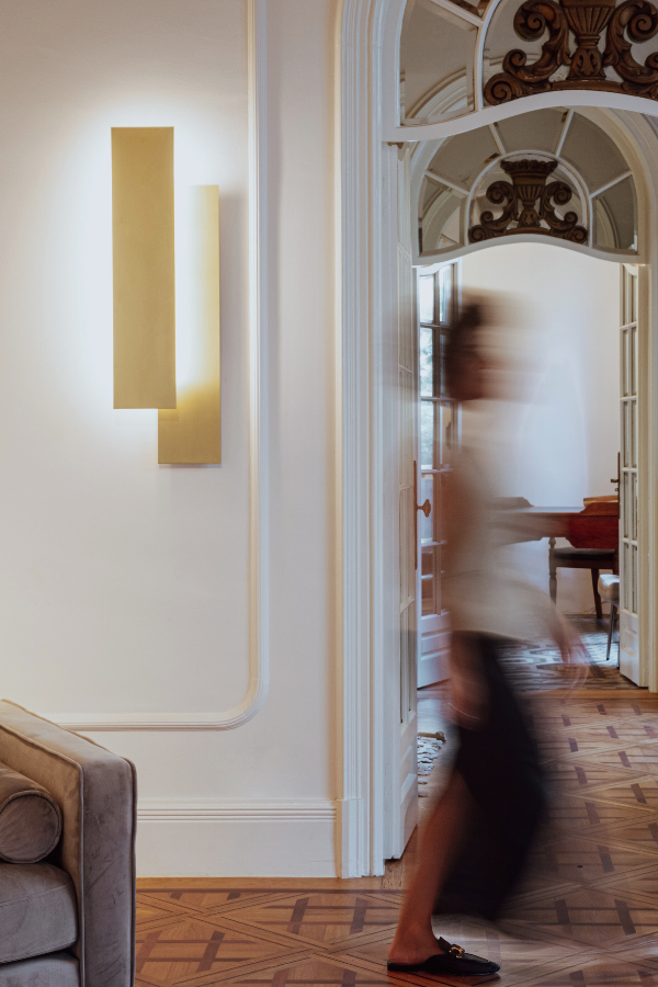 a woman walking across a room