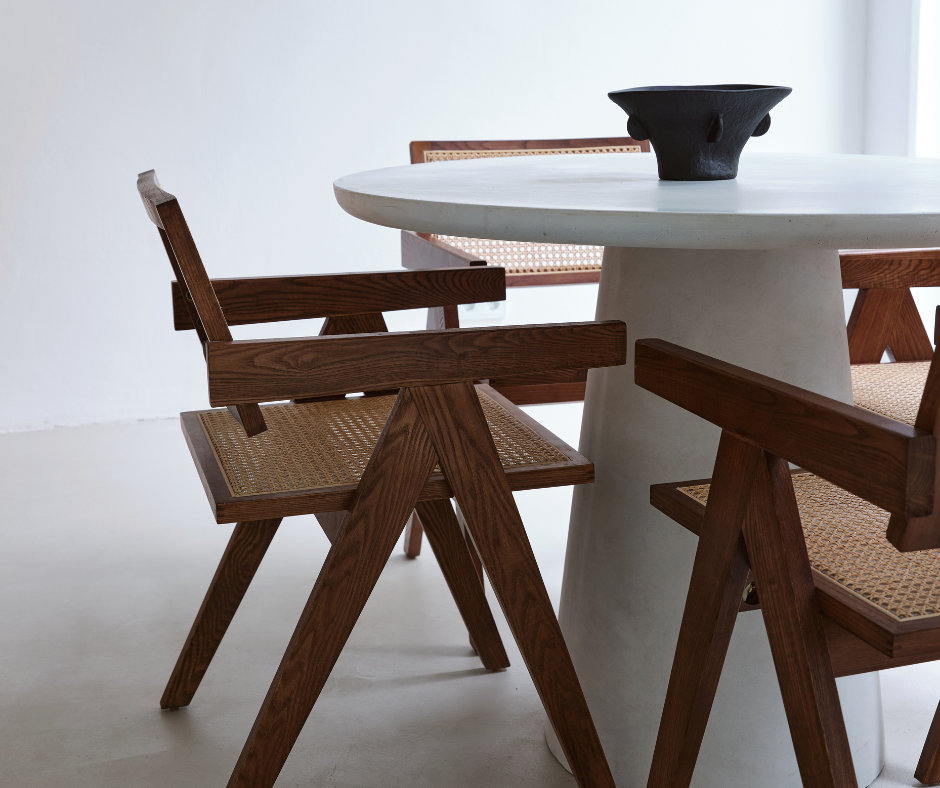 a round table with chairs around it