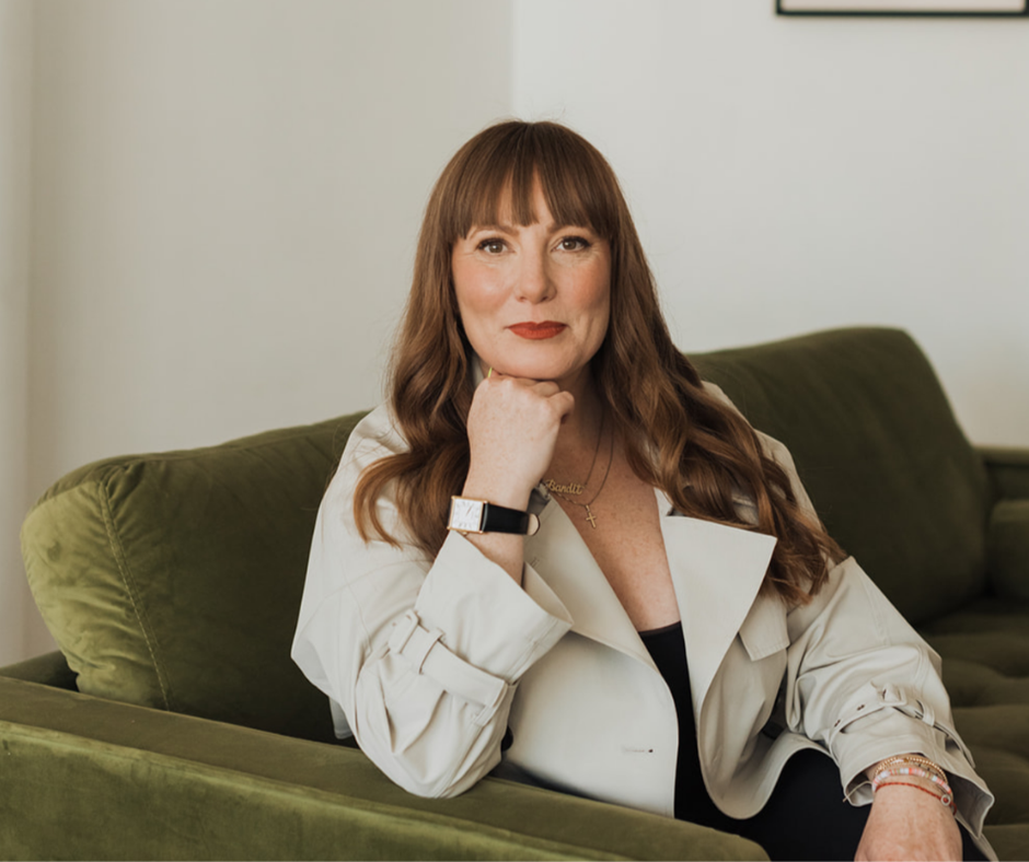 a portrait of Kara Duffy on a green sofa