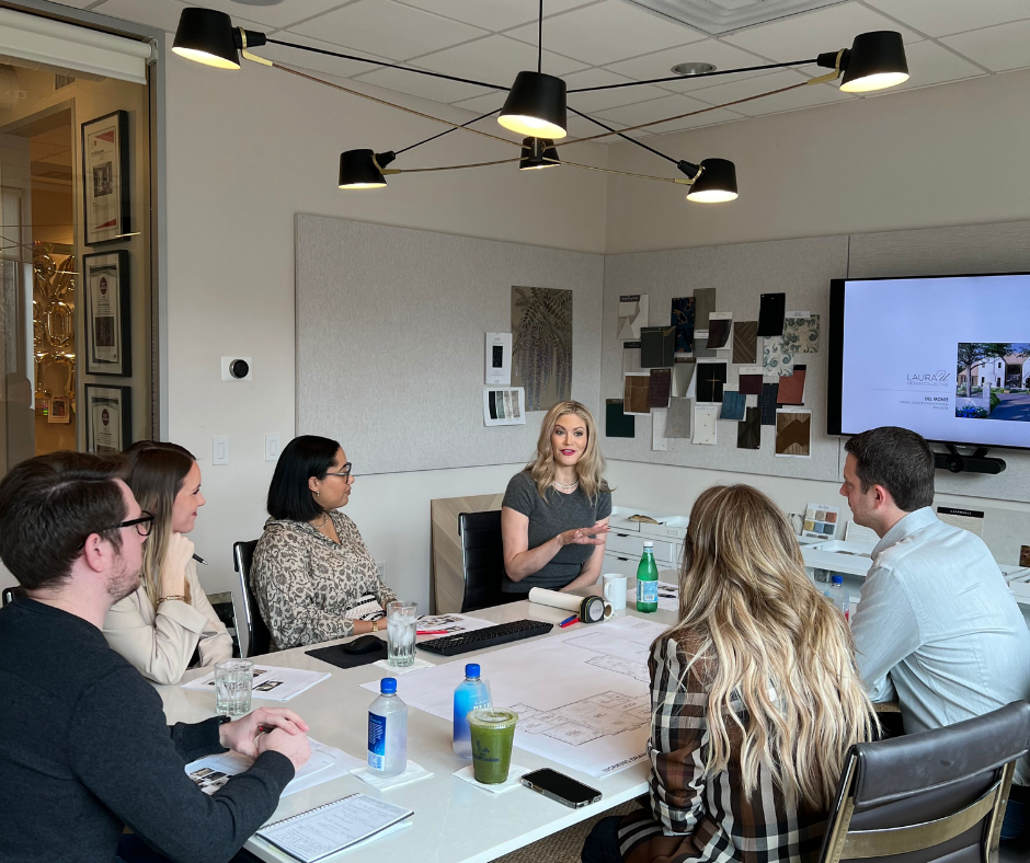 designers meet with clients to discuss