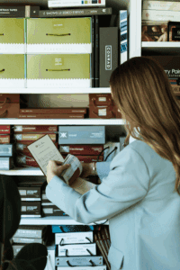 a designer arranges fabric swatches