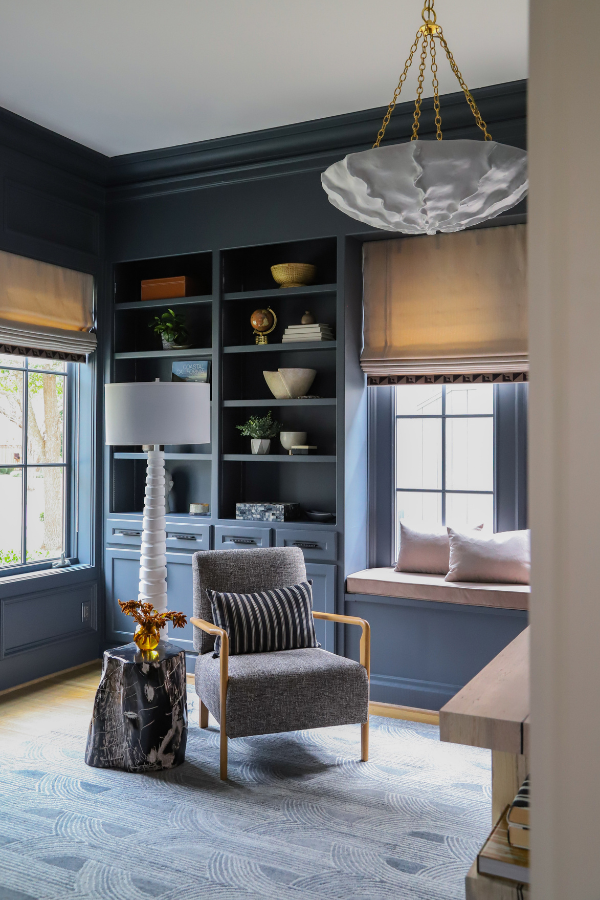 a blue interior designed by Laura U Design Collective