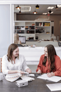 two designers sit together