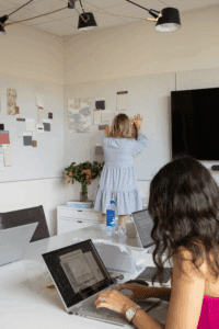 designers working on their computers in a studio