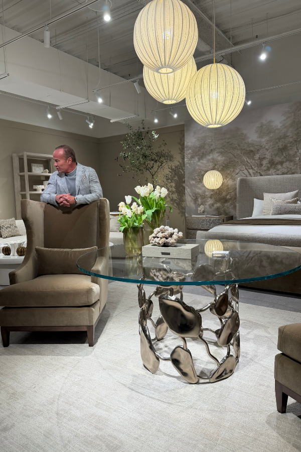 Alex Bernhardt Jr. discusses furniture design with DesignDash Meet the Makers attendees inside the Bernhardt showroom at Spring 2026 High Point Market.