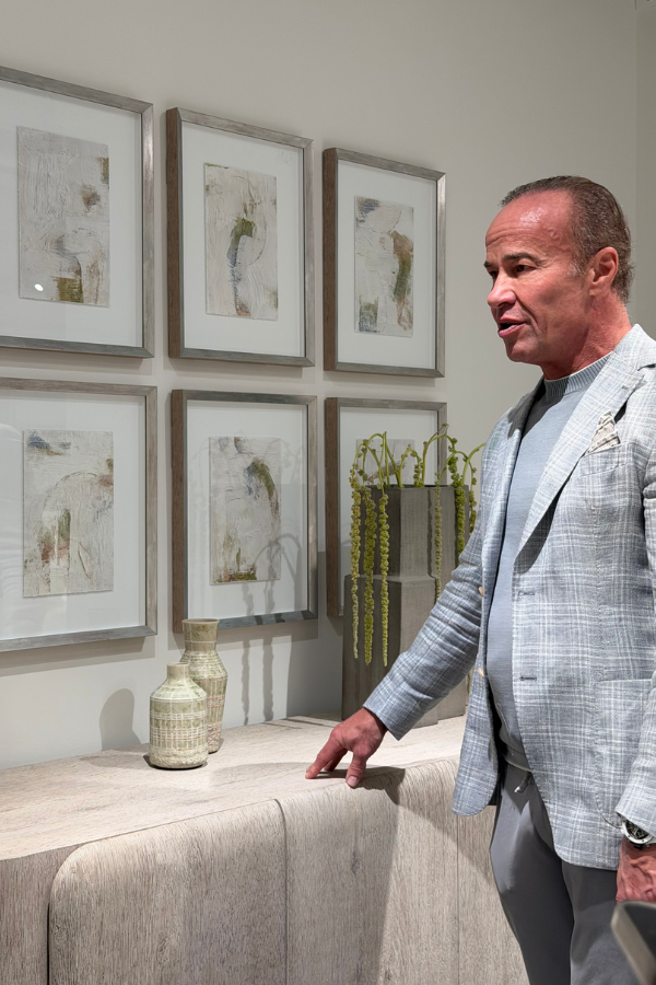 Alex Bernhardt Jr. discusses furniture design with DesignDash Meet the Makers attendees inside the Bernhardt showroom at Spring 2026 High Point Market.