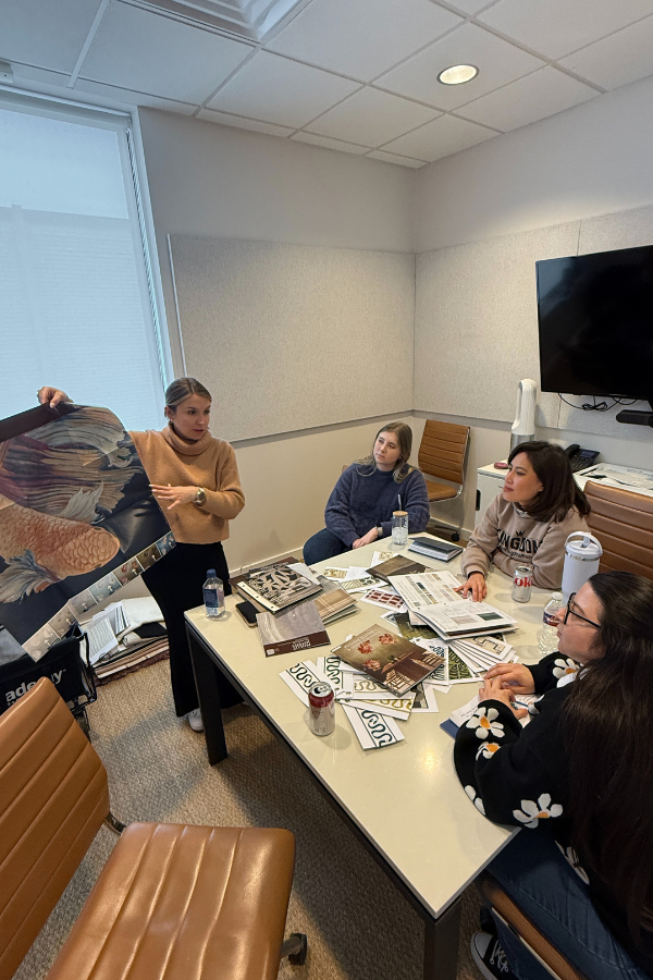 a vendor meets at the studio to show new product samples