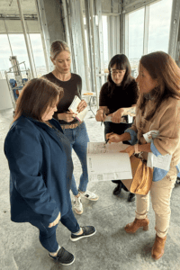 a team of designers gathered on a site