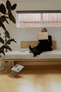 a woman working on her laptop